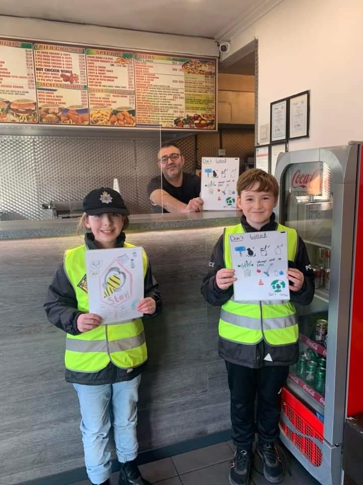 MissCorlessY6's tweet photo. Well done to our two superstar competition winners who now have their posters displayed in local shops and businesses. Thank you for displaying them for us! @MinipoliceR #stoplittering #saveourplanet #lookafterourcommunity https://t.co/GzuuWHC3op