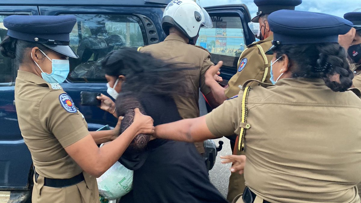 TamilGuardian's tweet photo. BREAKING - ITAK member Peter Ilancheliyan and his wife have been manhandled and arrested by Sri Lankan police for attempting to hold a memorial on Mullaitivu beach. https://t.co/VRekhMWm1S