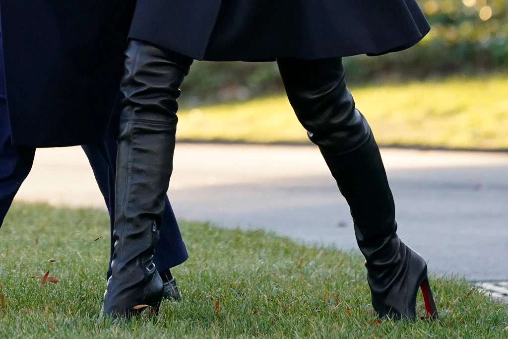 realHirondelle's tweet photo. On December 23, 2020—while 3,412 Americans lay dying from COVID in hospitals all over the country—Melania Trump flew to Mar-a-Lago wearing boots that cost $2,195. 

Now, what was that about a copper pot? https://t.co/nzB3PFjLjX https://t.co/c41r8MefHq