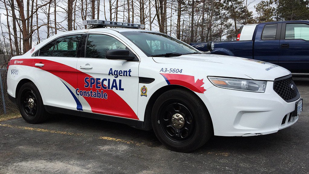 yetiayrshore's tweet photo. #copcarworkshop again today. New headlight a some other little issues on the Charger. Discovered that the Taurus was A3-5610 with @OC_Transpo Transit police in Ottawa. Kinda like the livery. https://t.co/OyylQsgpI3