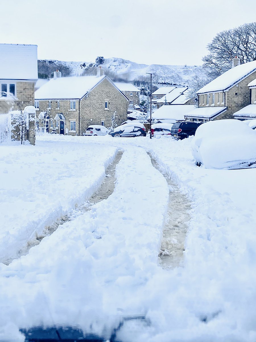 Age 30: I finally bought a snow shovel today and spent the afternoon digging cars out stuck in snow on our estate - this is the main road out of it. Good snow shovel, good snow shovel.