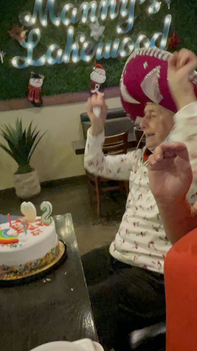 blueandsilver19's tweet photo. Pure joy on my beautiful mom’s face when the servers surprised her with the cake and sombrero. She makes 92 look great. Feliz cumpleaños, Mom!! 🎉🎂🥳💕 https://t.co/qmNKxU3akZ