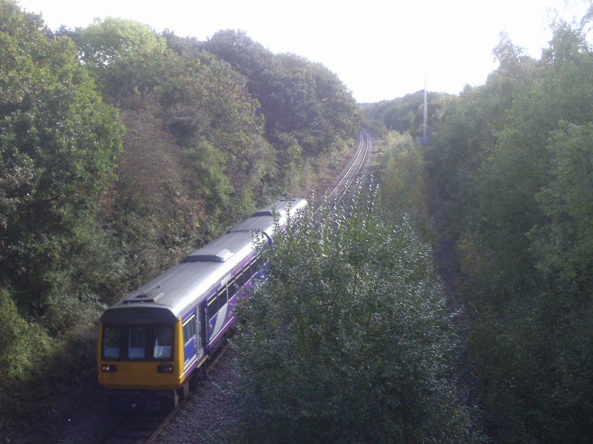 WetdogFBK's tweet image. Class 142 on former MR line at Old Royston, by this time a freight line serving a glassworks at Monk Bretton. I understand this working was for crew training. @JamesTGlossop  #Class142 #Pacer