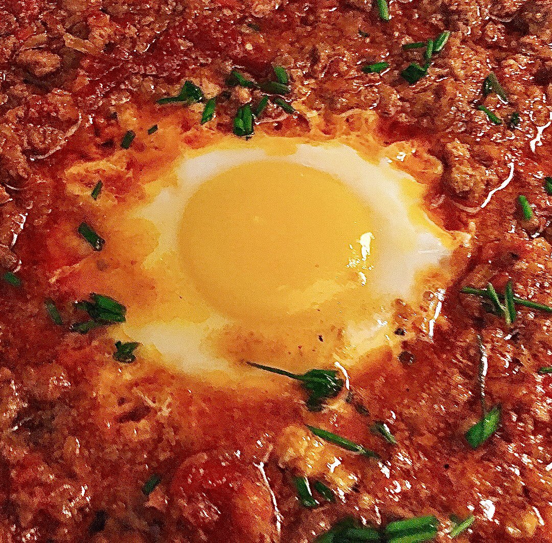 lemonmomcanada's tweet photo. Dinner for one!  Shakshuka’s sexy Italian cousin - Egg Bolognese 😍 pass the crusty garlic bread https://t.co/X1BLUenwxL