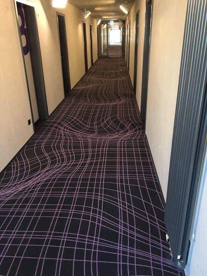 scott_kerr's tweet photo. Hotel uses an optical illusion carpet design to prevent running in the corridor https://t.co/lKFbSGDCJo