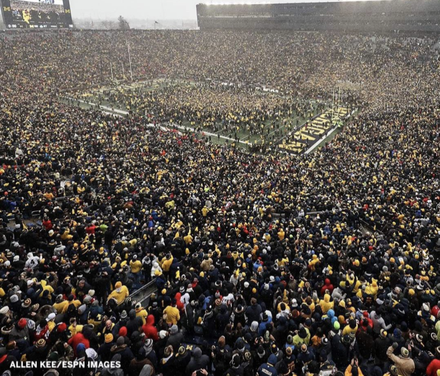 jkishore's tweet photo. This is crazy. Michigan is at the center of the pandemic in the US, and this is the UM football game. Today was a good day for #Omicron in Michigan. https://t.co/rZpine5UV4