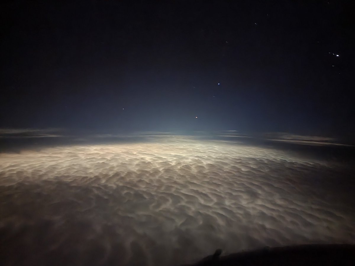 There's a whole lot of "Tim Hortons" down there!  Below those clouds?  Toronto.
