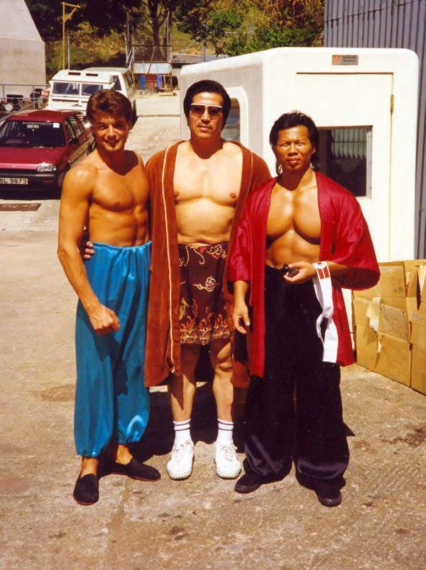 KFMovieGuide's tweet photo. #BehindTheScenes: Filming #Bloodsport (1988) in Hong Kong, featuring @JCVD, #BoloYeung, #DonaldGibb, #PauloTocha, #KennethSiu, #DavidHo and more.

Review: https://t.co/NB4vlWfsgR https://t.co/c0az0Gv1ak
