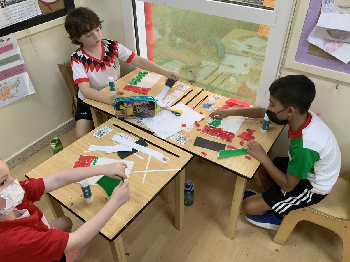 DESSyear2's tweet photo. #DESSYear2Yellow spent the afternoon collaging UAE flags 🇦🇪 We are ready for the parade tomorrow! @DESSsocials https://t.co/TCRxn4l9dm