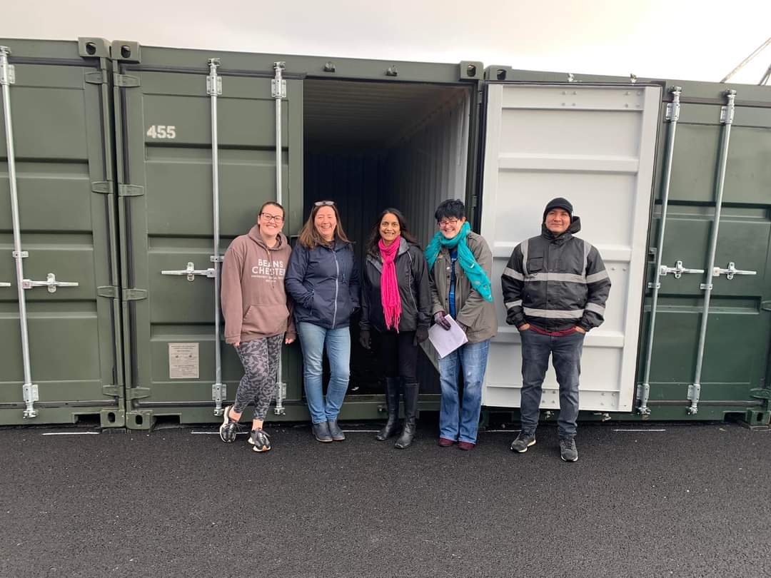 RefugeeKindness's tweet photo. We made the big move today at @lockstockbiz, from our 20ft unit, which we had outgrown, to our 40ft unit. It was really windy, wet and cold, so a big thank you to the volunteers and beneficiaries who helped. https://t.co/QN6VS1dHga