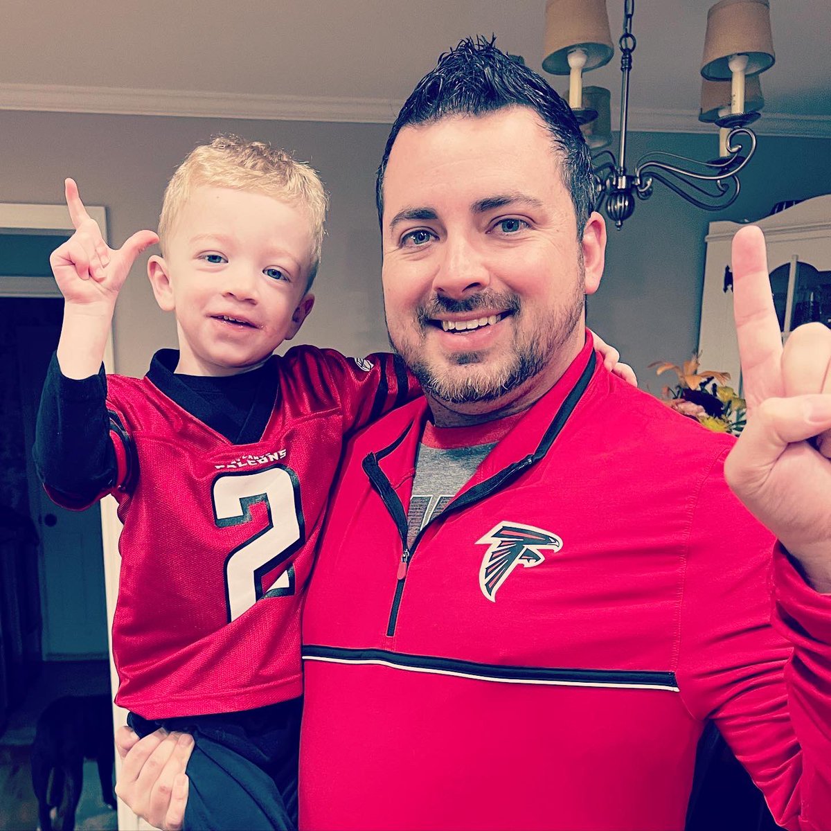 BakerBroadcast's tweet photo. After spending Thanksgiving week with the New Orleans family, we had to put our Atlanta gear back on today. And no matter how bad the Falcons might lose today, we got them @braves baby! World Champions forever! #ATL #Falcons #Braves #AtlantaBorn #AtlantaRaised https://t.co/8HhWwz7tpm