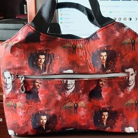 MargeRocker2014's tweet photo. Love my handmade @tomellis17 lucifer purse i got in the mail today ! https://t.co/ISnW0slG7t
