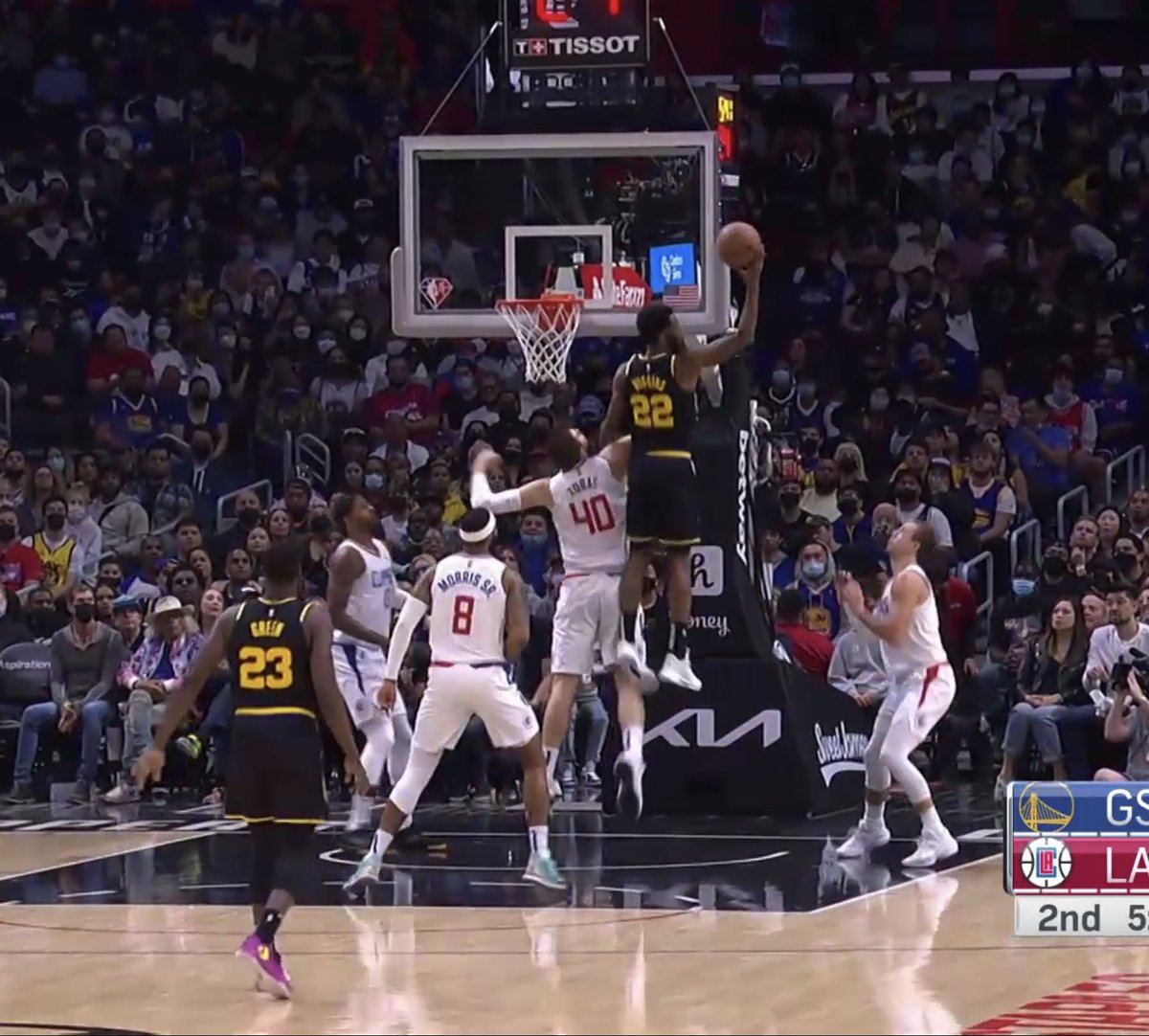 Andrew Wiggins FLYING to get the rebound