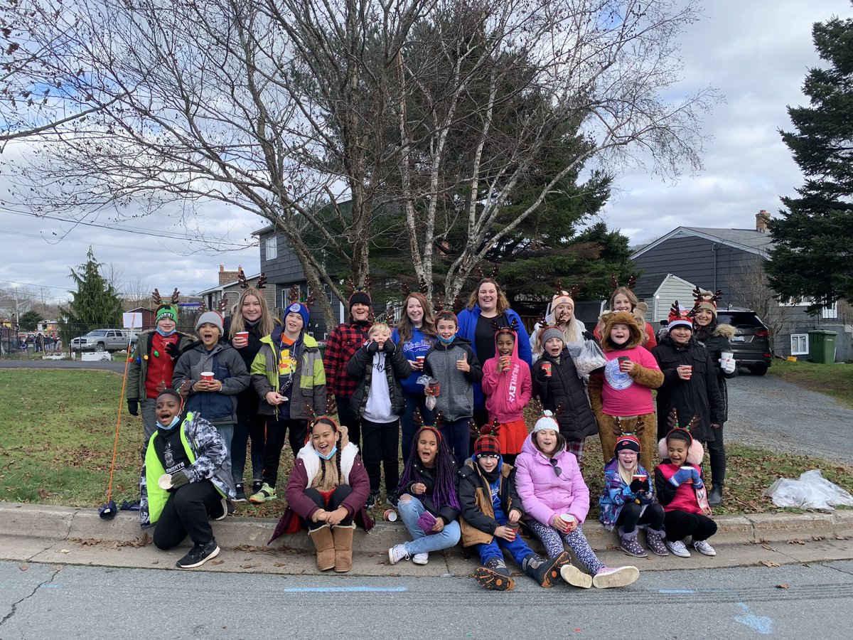 ChebuctoH's tweet photo. Chebucto Heights staff and students excited to spread some holiday cheer and walk in the Spryfield Santa Claus Parade! @HRCE_NS #tistheseason #spreadjoy #HappyHolidays https://t.co/aw05GnVm56