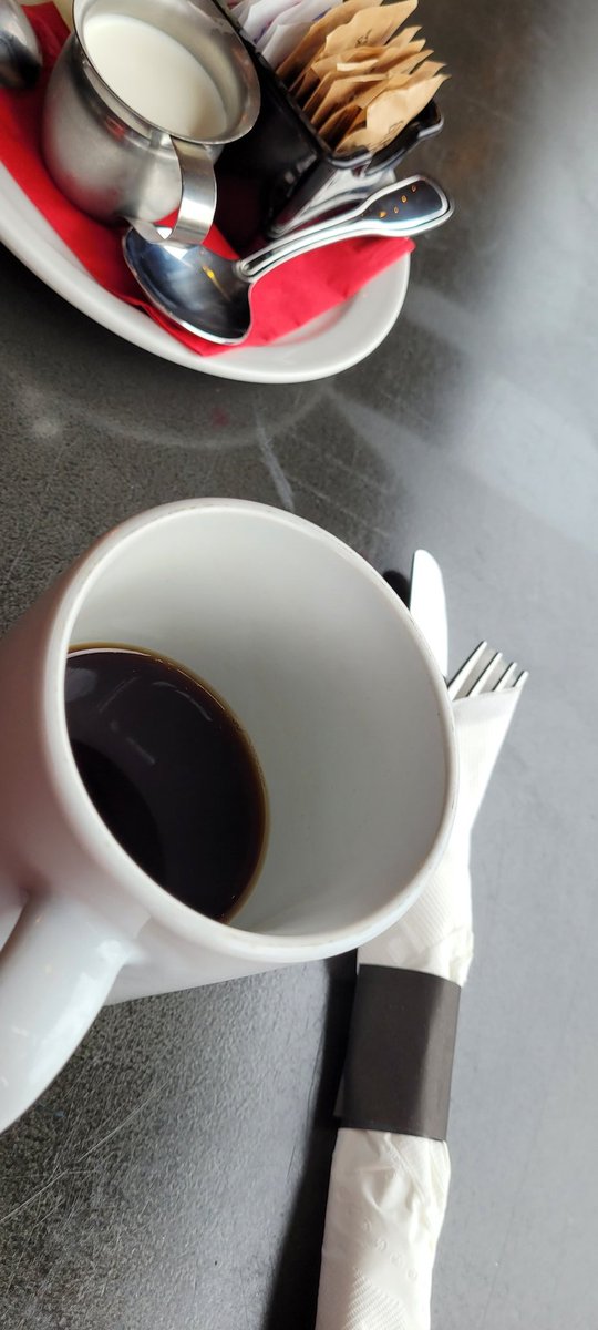 BarbChamberlain's tweet photo. #Coffeeneuring #4 (without expectation of getting to all 7): #undriving errands + bike date with my sweetie. Outside under shelter sipping coffee waiting for brunch, which was an impromptu decision. Home will be a #RideInTheRain trip. https://t.co/nn83cDTzgd
