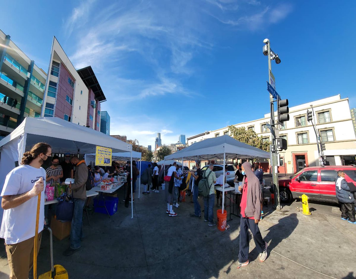 SCVCAN's tweet photo. Black Friday Free Market marked a special return to 5th and San Pedro. Before only a handful of volunteers, a few tables, and an unwavering desire to make community care a reality.
On this block and on every block, we can make this a reality!

This is #solidaritynotcharity https://t.co/NX3wHWEjhV
