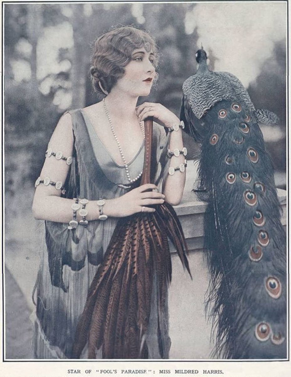 RT @MoviesSilently: Mildred Harris with all the bracelets  + peacock https://t.co/dGsd4zsGFV