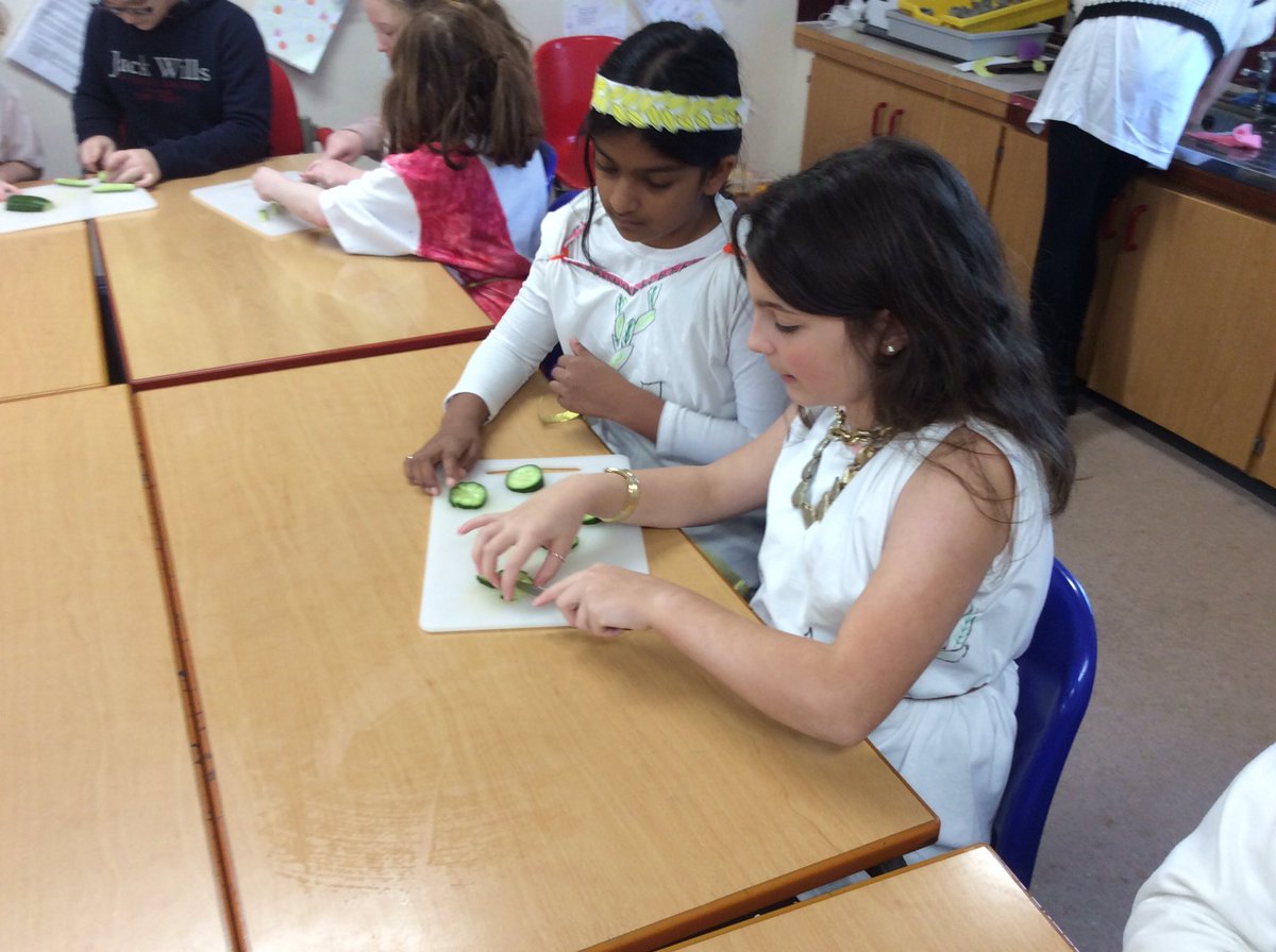 Year 6 children are enjoying their Greek day! We are making Greek salad, Tzatziki, clay plots and visiting the apothecary!#AncientGreeks