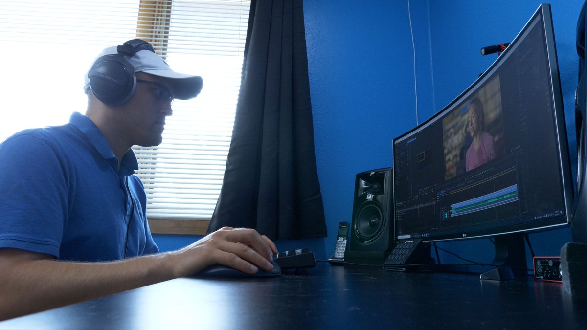 Wesley editing at the office.