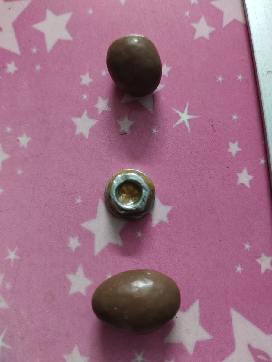 CaGgulati's tweet photo. See what came to my kid's mouth while eating Cadbury Rich Dry Fruit Chocolate.. seems to be a nut bolt... it could have been fatal...A narrow escape for the kid. #cadbury_india #fssai https://t.co/S8cU5UtsJp