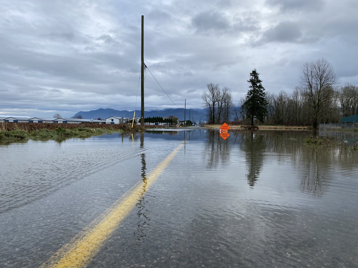 HeatherCTV's tweet photo. Five minutes ago there was no water on this road - levels rising pretty quickly though residents say it’s not coming as quickly as last time. #Abbotsford https://t.co/eS17LhkyQu