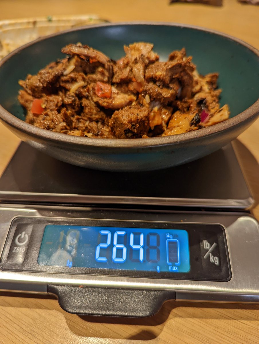 Maybe 10g of tomato in here but let's hear it for the good people at the Norwalk, CT <a href="/qdoba/">QDOBA</a> who overscooped me by ~30%. Chipotle, IMO, is tastier but becoming a fraud victim is a heavy price to pay for flavor.