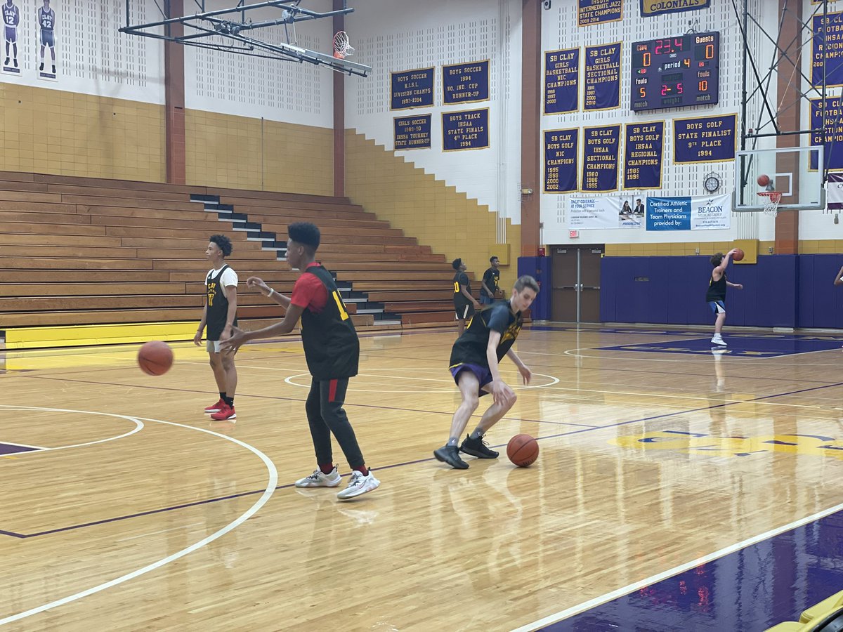 KatieRod7's tweet photo. Varsity Boys Basketball getting ready for their NIC opener tomorrow night!  We host the Falcons of John Glenn!  GO CLAY!!!!! 🏀💜💛 https://t.co/DQ6xmHhhz6