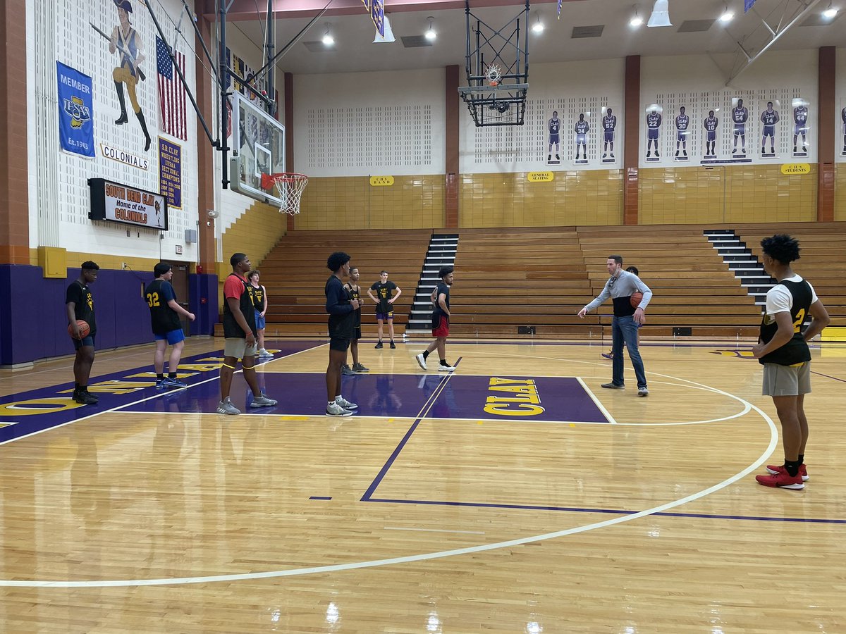 KatieRod7's tweet photo. Varsity Boys Basketball getting ready for their NIC opener tomorrow night!  We host the Falcons of John Glenn!  GO CLAY!!!!! 🏀💜💛 https://t.co/DQ6xmHhhz6