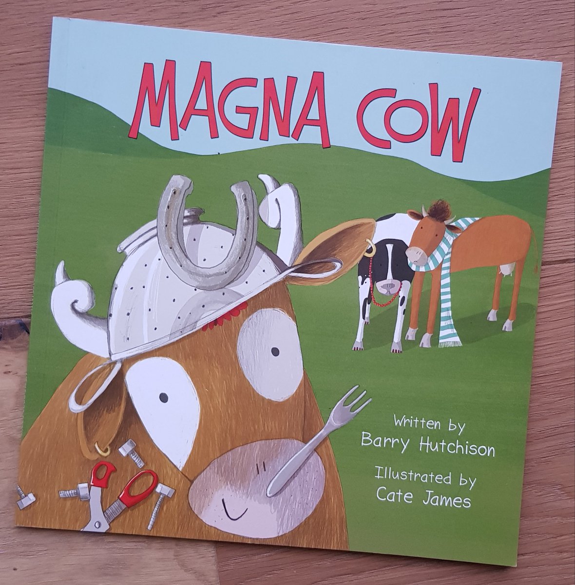 littledoorbooks's tweet photo. #LittleDoorChristmasAdvent on day 6 of 23 we bring you the fantastically bonkers #picturebook #MagnaCow by @barryhutchison and @catetheartist . Brisket the cow has strange magnetic powers which get her into trouble but also help save the day. #shoplocal https://t.co/dOlOE7J8e8 https://t.co/CiXaHl0zS7