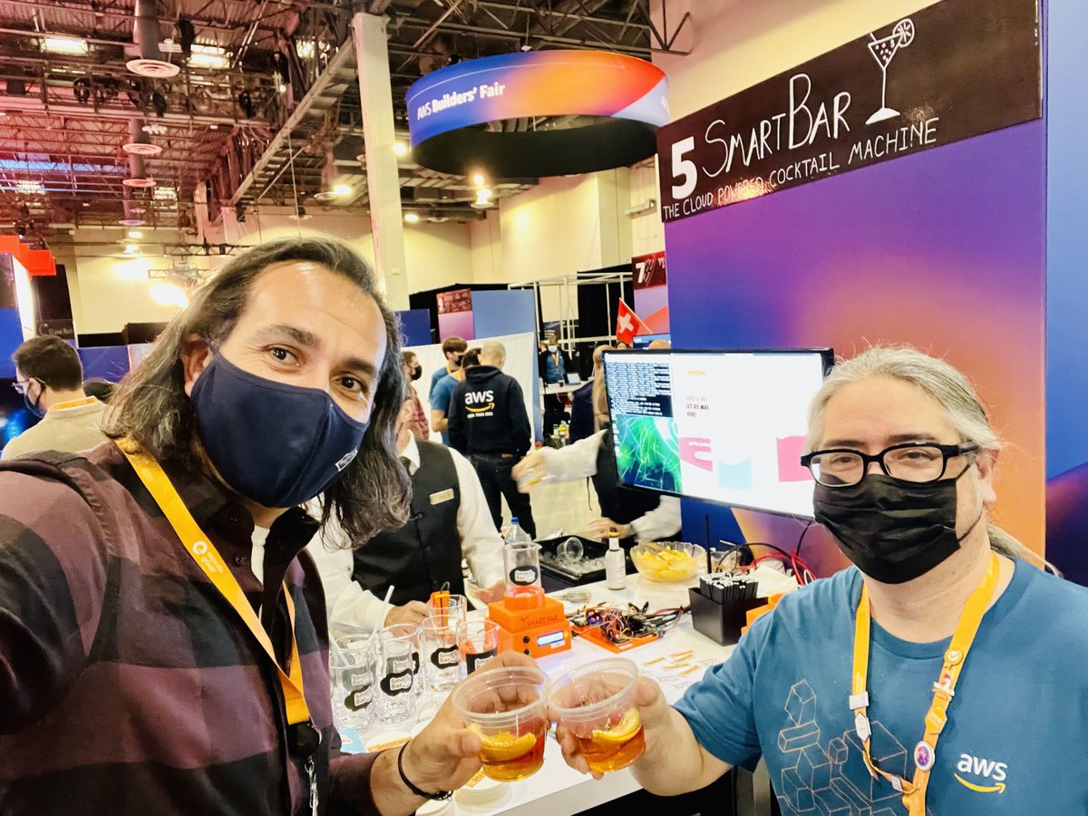 AdrianDeLuca76's tweet photo. Cheers! The Smart Bar uses #AWS #cloud to mix the perfect old fashioned. When I asked Lee Fox how he gets the perfect shake, he told me a CPU fan loaded with magnets does the trick?!? #reInvent #BuildersFair https://t.co/vTWOVu2kNn
