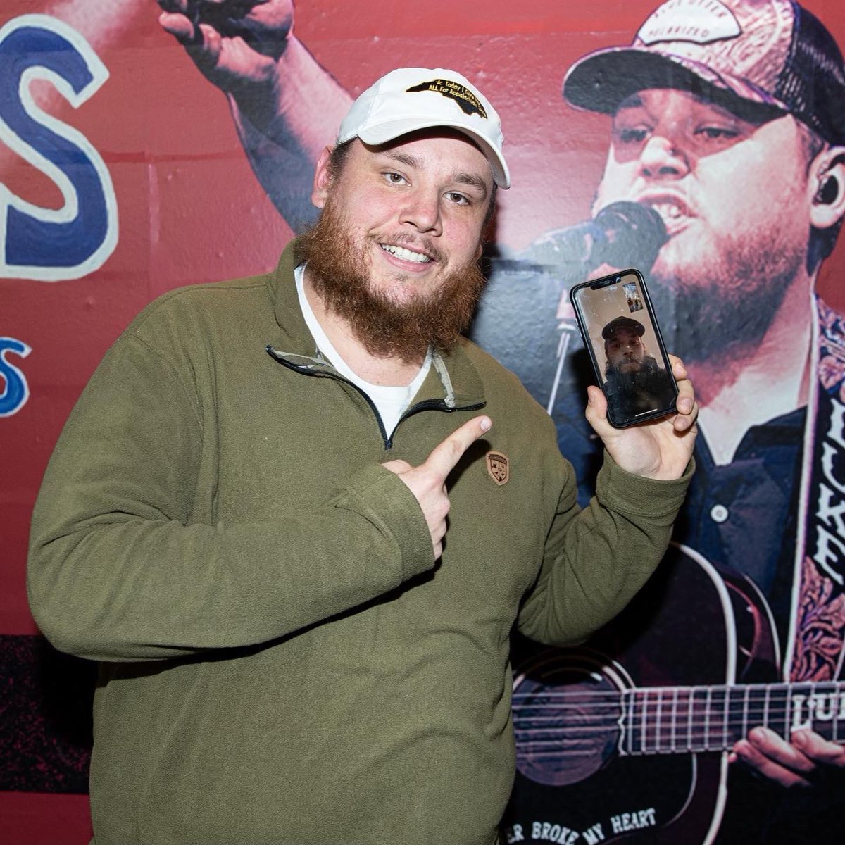 TheGarden's tweet photo. A special moment backstage tonight! NY Rangers player Ryan Lindgren surprises Luke Combs over FaceTime with a custom jersey to celebrate selling out two back to back nights at The Garden! https://t.co/y8El9YkSfT