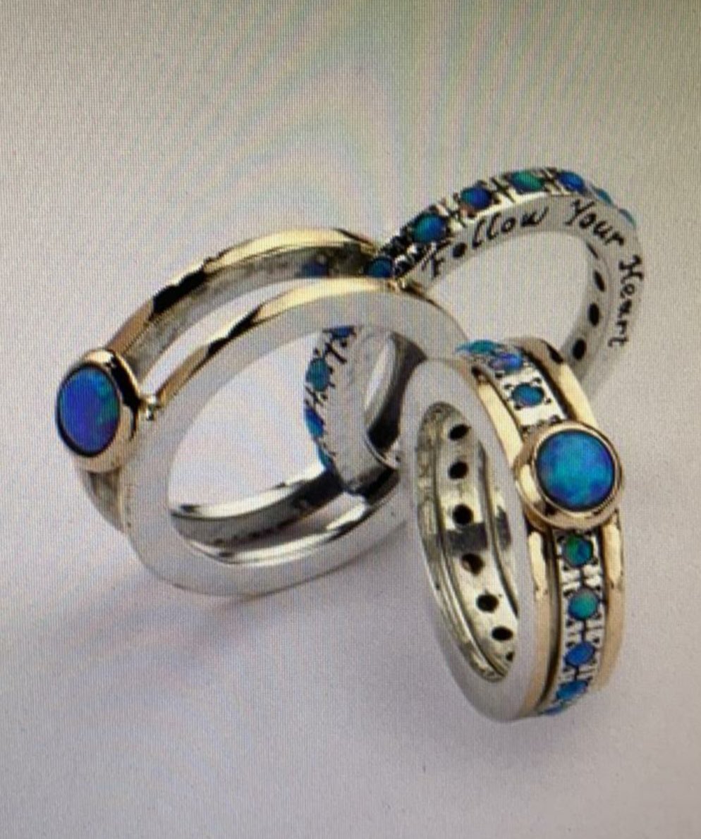 Follow Your Heart ❤️ Ring 

Fabulous fashion and sleek style. A signature piece, sterling silver, 9-carat gold ring set with Opal stones. #gemstonejewelry #yaronmorhaim
