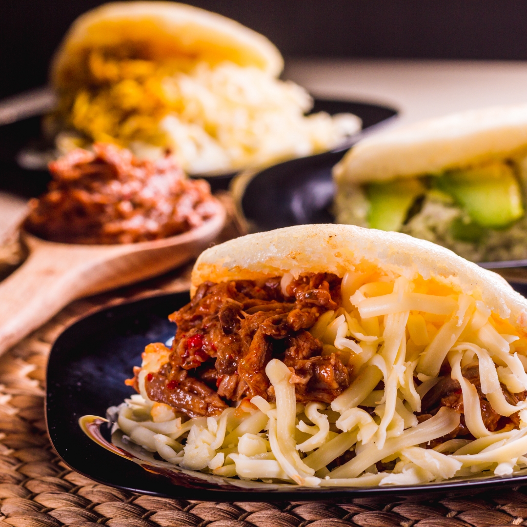 A Venezuelan arepa is a patty made out of cornmeal and water that can be baked, fried or grilled. They can be eaten plain or stuffed with cheese, meats such as BBQ chicken or pork, or with black bean. 😋

#wanderlust #lovetravel  #UKTravel #travelgoals #holiday #Arepa #Venezuela