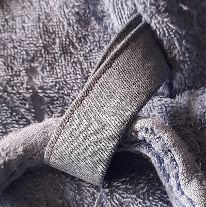 ragbagmending's tweet photo. What's the oldest piece of clothing that you still regularly wear?
This is a new (denim) belt loop added to a 25 year old dressing gown. Theoretically it belongs to my husband, because I bought it for him when we first got married. In practice, I wear it far more than he does. https://t.co/ctAujJfXdb