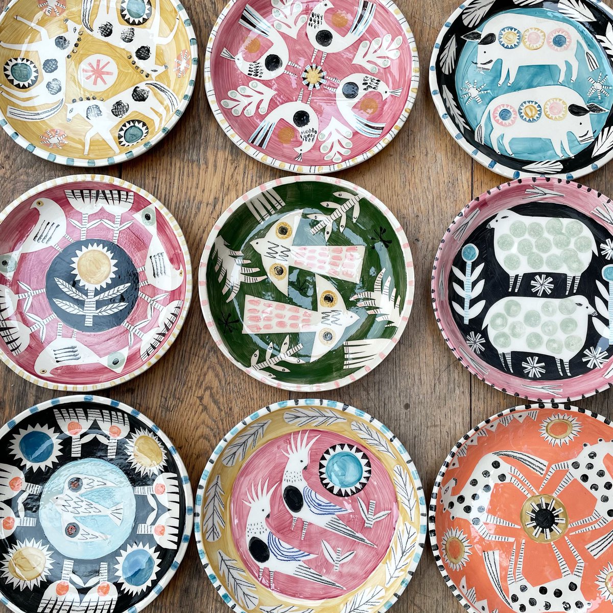 I will be listing all these hand painted earthenware plates on my website at the end of the week ! #ceramics #handbuilt #handdecorated