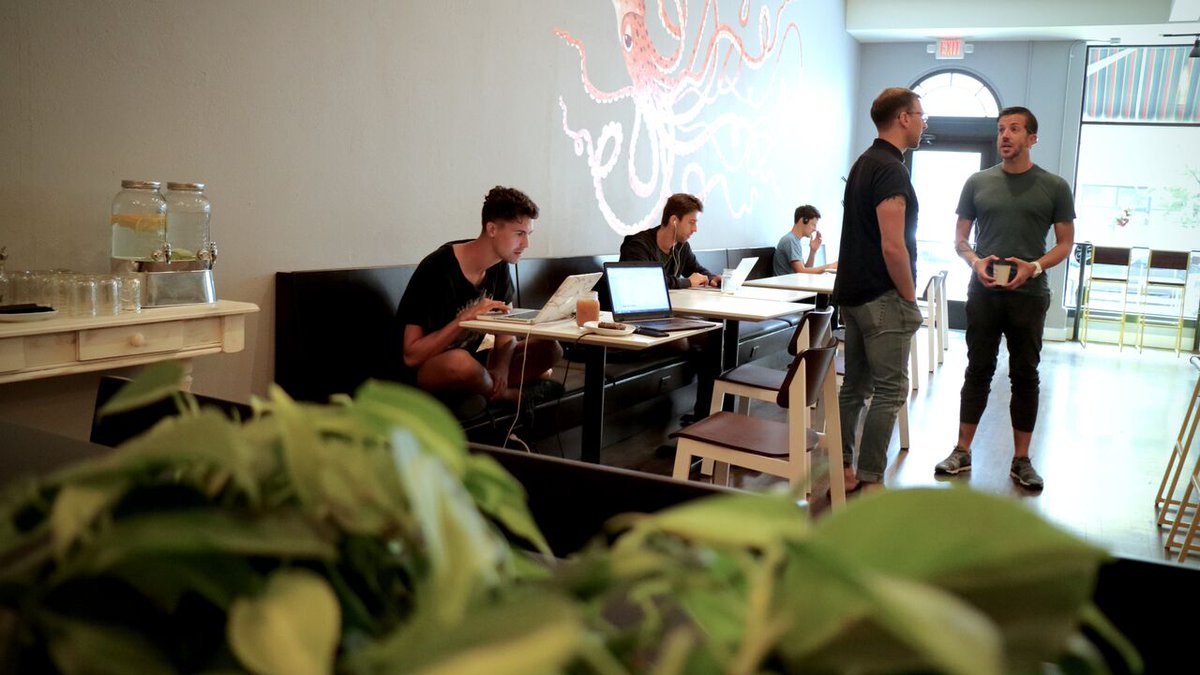 A vintage building converted into a storefront coffee &amp; wine bar. Visit bazzani.com to learn more about our projects!