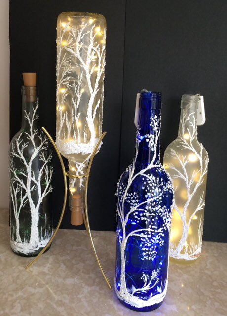 WAVE artist Rosemary Miguez and her unique bottle art.  Wouldn’t these make a beautiful display for your Christmas table and guests?  #interlakeartist #christmasdelights.  Check out the WAVE website for contact info…