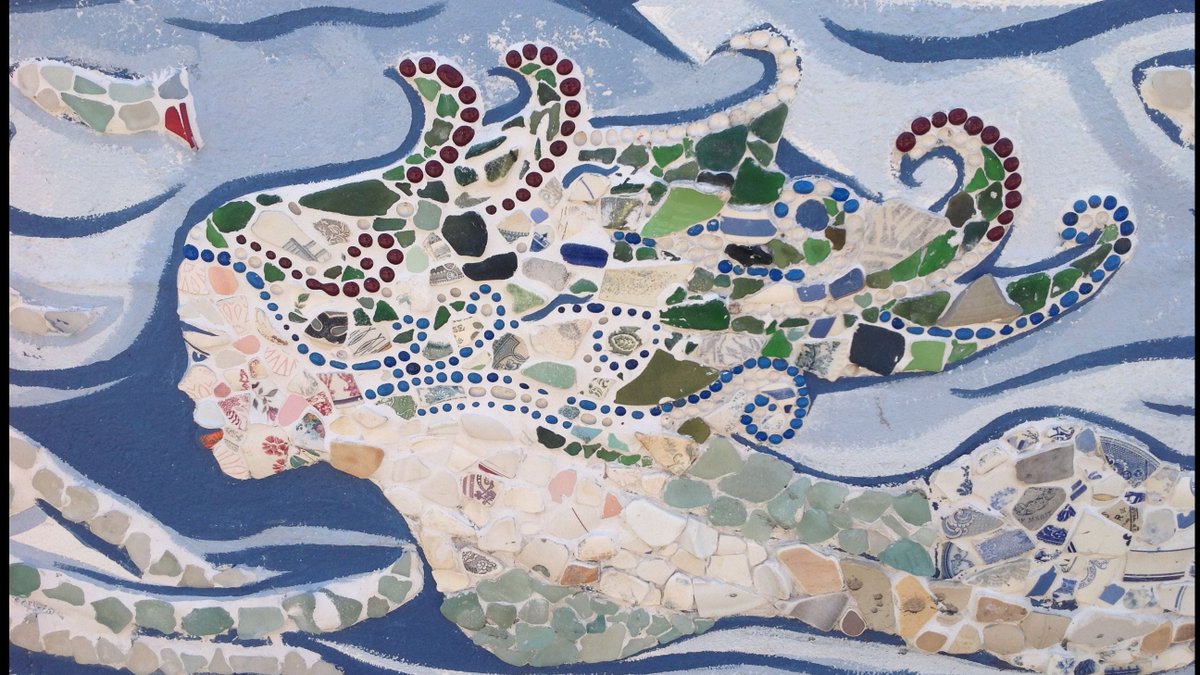 c_duigan's tweet photo. The #ceasg is a #mermaid in Scottish #folklore with the upper body of a beautiful woman merging with the tail of a salmon; maighdean na tuinne ("maid of the wave") or maighdean mhara ("maid of the sea").
#Footdee #Aberdeen #Mosaic #Art #StAndrewsDay #Scotland #Gaelic #nature https://t.co/gUbNMGTzz1