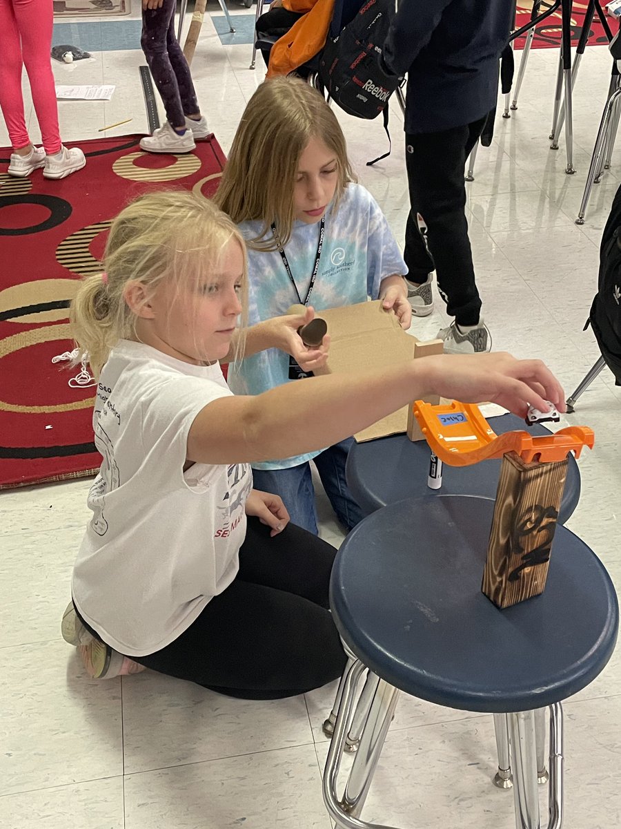 Sherrihdaniel's tweet photo. Science in Action at ASE. Exploring forces and energy! Rube Goldberg Machines. @ASES_Mavericks @WoodsComal https://t.co/iiUJ3pS6Df