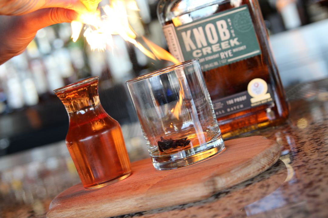 BourbonBonesAZ's tweet photo. There's no better way to warm up this fall than with a glass of the Glowing Star Sazerac. 🔥 #bourbonandbones #scottsdale #santan #arizona #arizonafoodie #drinkstagram https://t.co/PdaC40bYPT