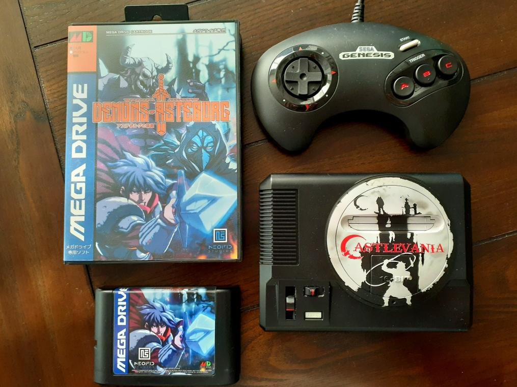 theWellRedMage's tweet photo. ✨This week's treasure trove✨

Custom modded Sega Genesis mini inspired by Castlevania stuffed with games (DC, 32X, CD, GG, Gen/MD) using an exterior flash drive, comes w/ 2 controllers plus Demons of Asteborg MD cart by Neofid!

More pics + info below

💙Tag a Genesis/MD fan💙 https://t.co/mWVbUirzLC