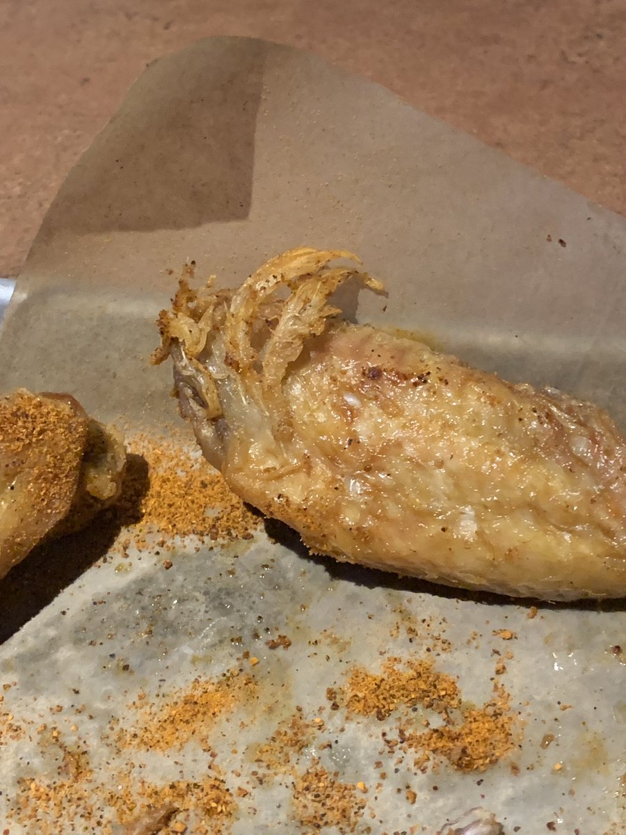 Susan_Tharp's tweet photo. Eating dinner at the Crawfordsville @BWWings with @AaronKeller5 and found feathers on my flat. Is this common? Asking for a friend ~Matt https://t.co/tWd2crLbQD