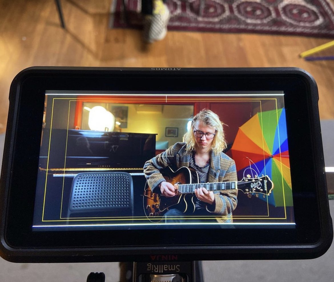 A great snap of Caspar on camera, riffing on the 🎸 ahead of an interview all about Colours of Home!

He and Celia Craig will be touring from Term 2 in 2022, so be sure to lock them in for visit to your school. #MusicEducation