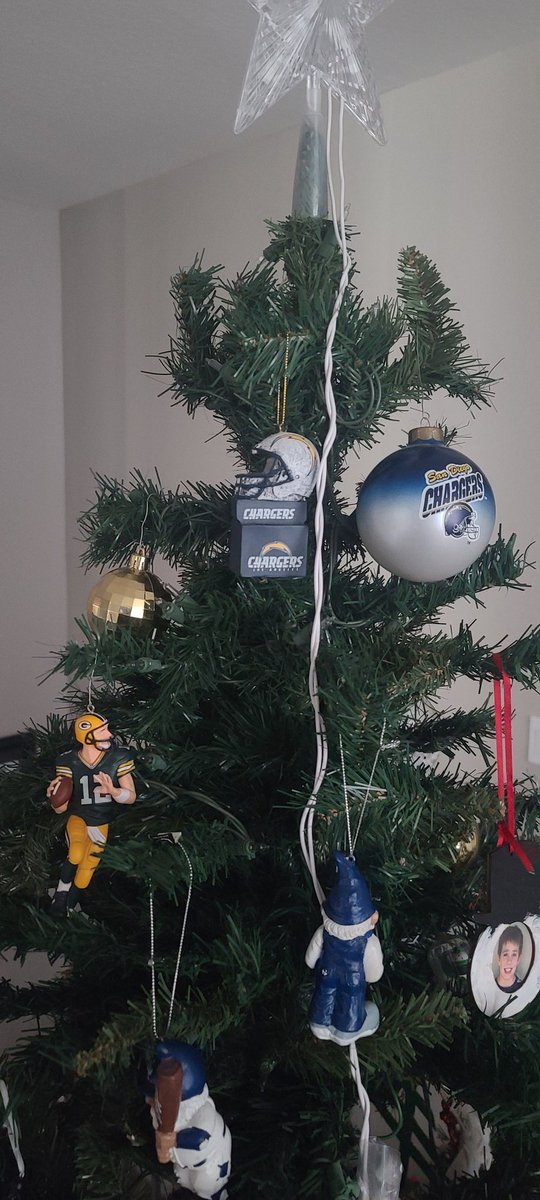 My youngest made sure the Chargers ornaments were higher than my wife's Packer ornament! #BoltUp #RaiseThemRight #BoltFam #DHBC