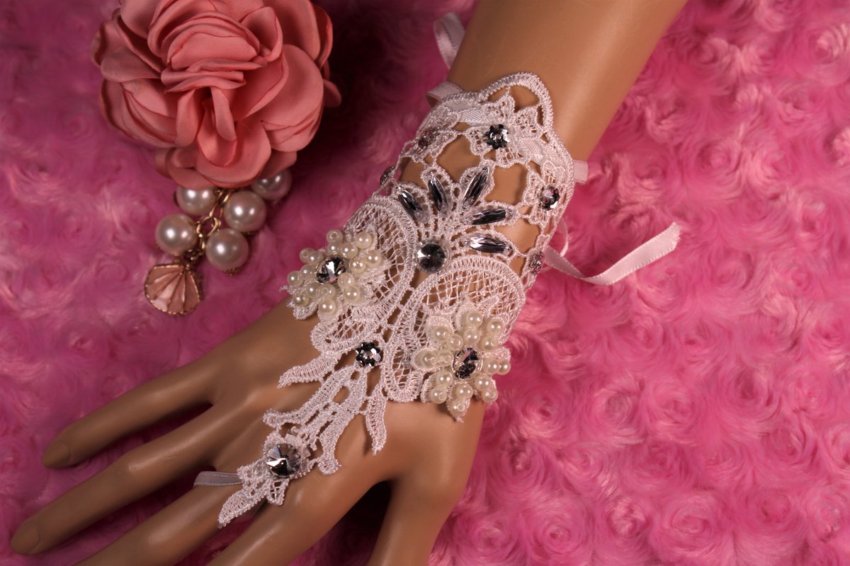Romance & Glam...Everything Wedding Fingerless Bridal Gloves Should Be! Floral Lace, Synthetic Pearls and Crystal Rhinestones! #weddinggloves #bridalgloves #lace #pearls #wedding fringeflowersandfrills.com/epages/2121588…