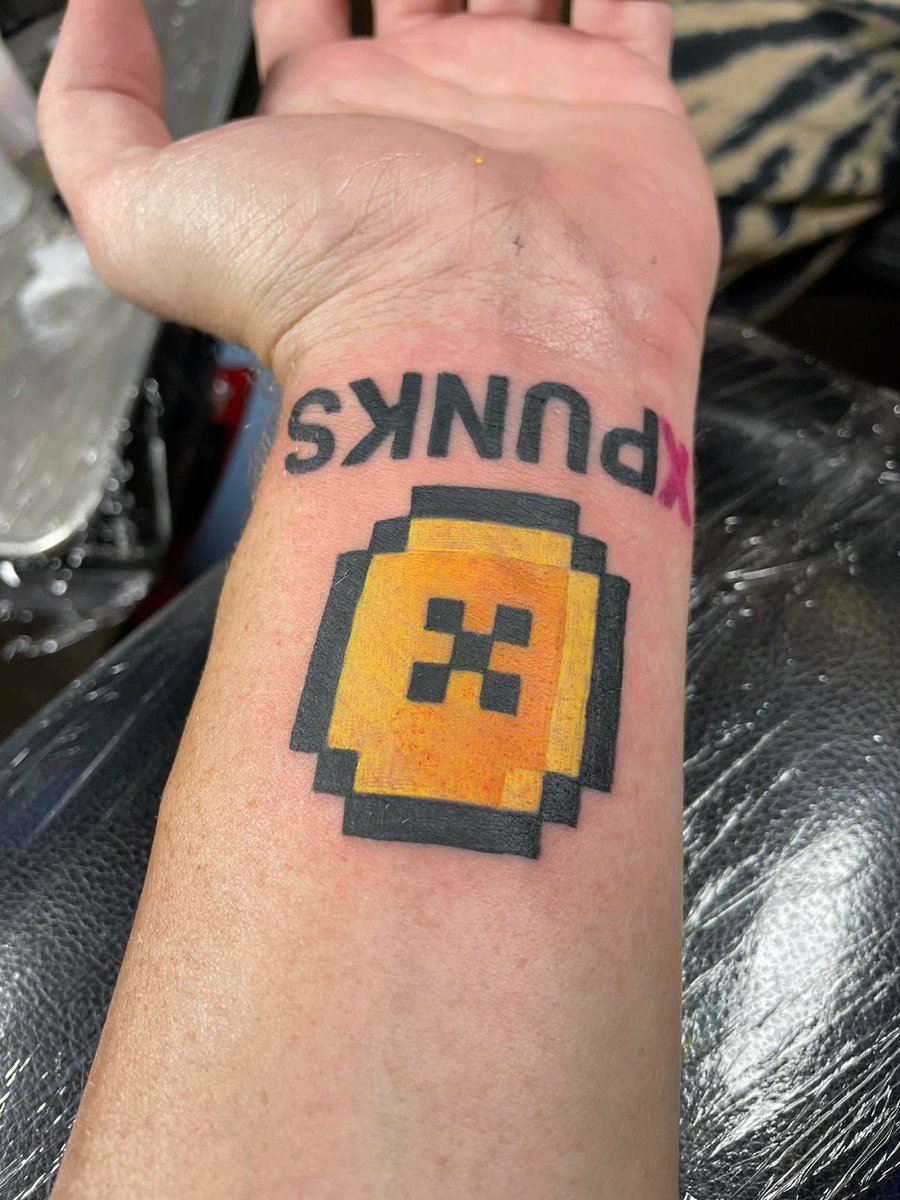 XPUNKNFTs's tweet photo. This time our own @xrpglustic got an #XPUNK tattoo😳 This is awesome❤️ What a community we have🙏 Let’s give him lots of love! https://t.co/etGtc5GmJo
