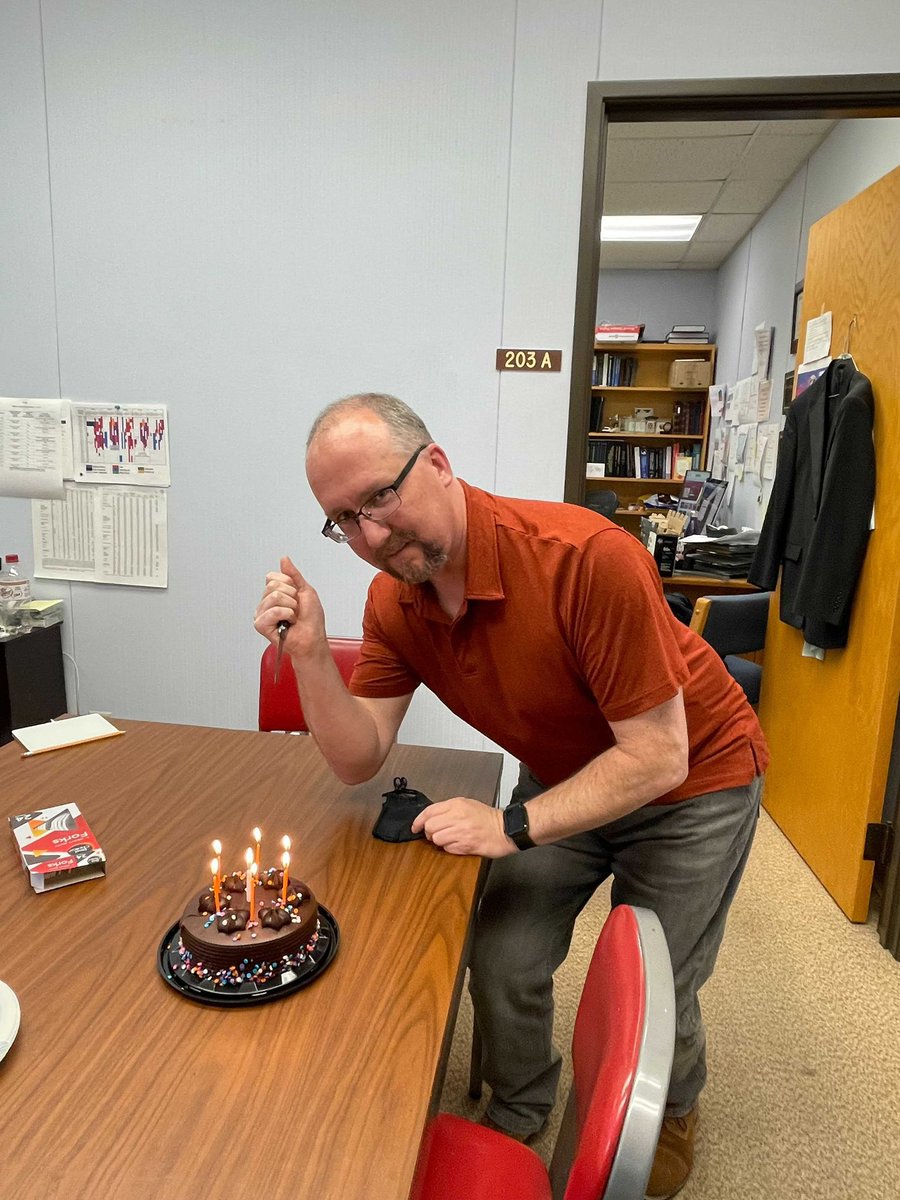 RaffertyLab's tweet photo. Sadly after 7 yrs my b-day secret has been discovered by my group. Thanks for a great cake and celebration. My year goal is to figure out how to cut a cake correctly (Halloween cutting techniques used). #birthday #AmazingGroup https://t.co/oQ6EyDSeMy