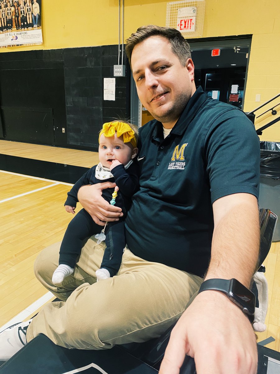 Jess_Lovett's tweet photo. Dada had a pretty good assistant on the bench tonight! Love that Cam gets to see all the hard work and dedication Tom puts into each season 🖤🤍💛 #GoTigers https://t.co/dr75ztHfLj