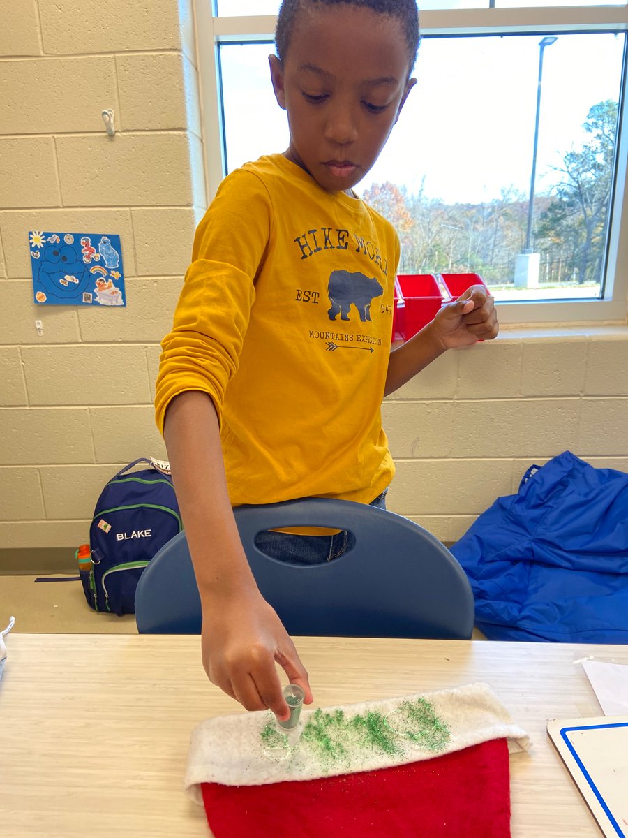 SpookTacoma's tweet photo. Holiday fun!! Putting their name in Glitter on hats “Wisk you a merry Christmas“ gifts the students are making their teachers and trimming the tree!! https://t.co/bLGHL4hVp8