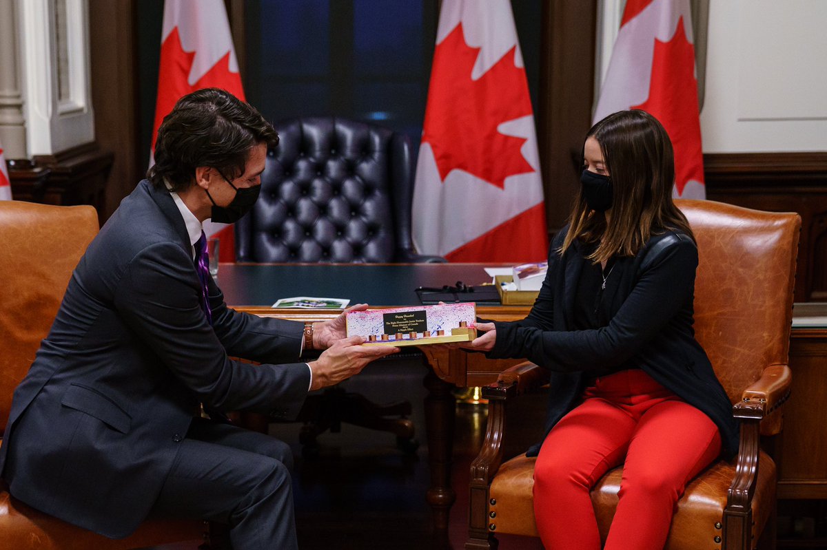 JustinTrudeau's tweet photo. I spent some time with volunteers from A Ripple Effect today - they spoke about the work they’re doing and how people are pulling together to look after one another. It’s the epitome of Tikkun Olam. Thank you for stepping up to serve your community, and thank you for the Menorah! https://t.co/CvmKhYhbnn